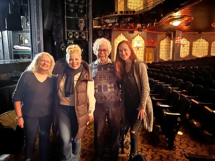 A group photo in a theater